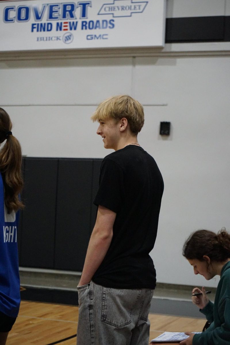 Thomas Bockholt joins the Varsity volleyball team as a manager on October 4th, as they take on Bastrop High School.