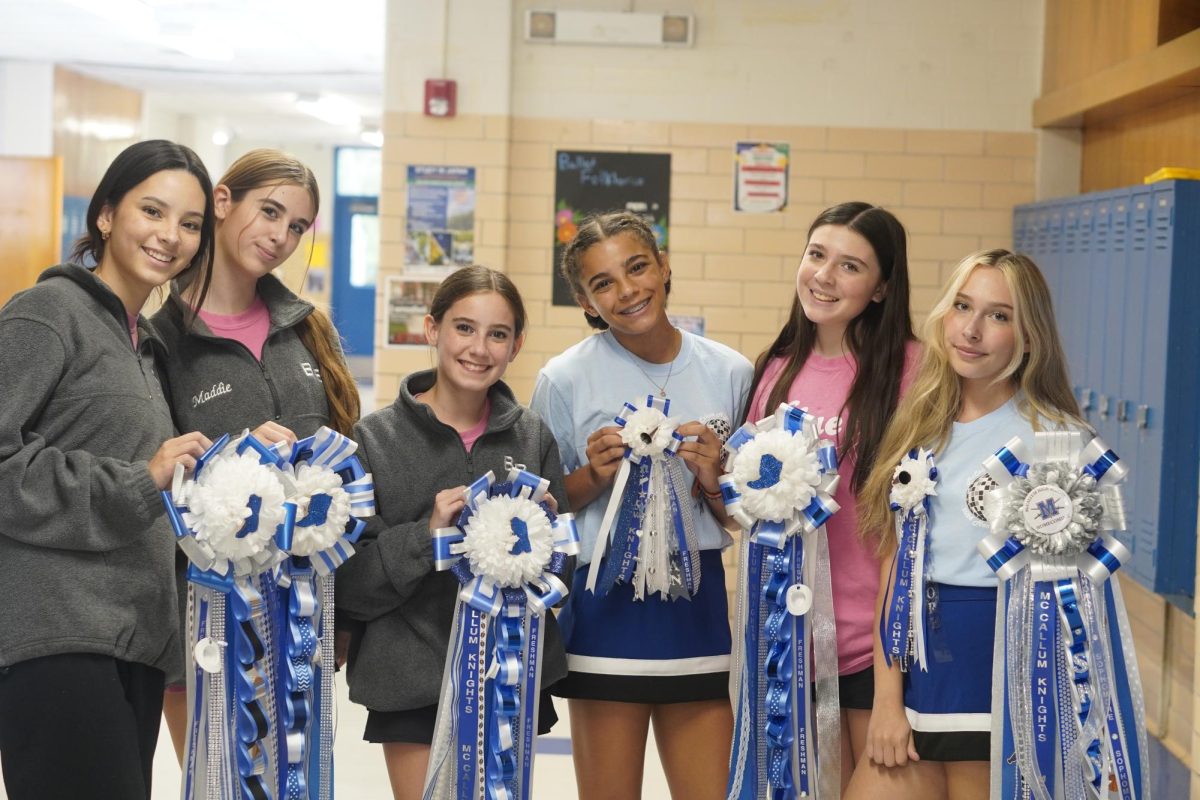KEEPING TEXAS TRADITIONS ALIVE: Blue Brigade members and cheerleader underclassmen prepared for homecoming and showcased their mums for the event. The Blue Brigade officers and two Blue Brigade moms made the mums for the team.

Sophomore Cheerleader Shayla Allen said she likes how much creativity people put into making their mums, and appreciates the Texan tradition.
 
 “Homecoming is a lot of fun, especially with the football game and showing off the mums,” Allen said. “It's cool to see how much effort people put into making mums, and it’s fun to show them off.”

Caption by Hudson Hensley.  
