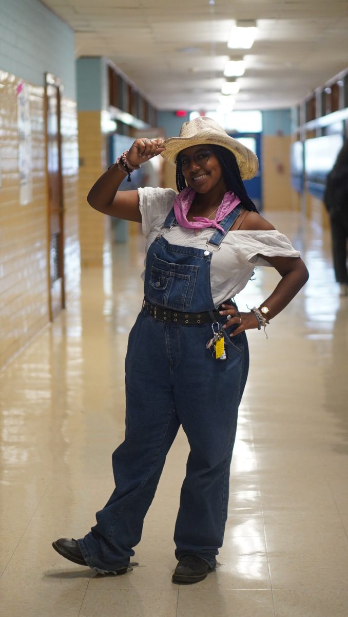 COWBOYS HATS FOR HOCO: Senior Lucy Zanker participates in the Western vs West Coast homecoming theme day. There were different themes every day of the week to get students spirited for homecoming.

This spirit day gave Zanker an excuse to wear a new article of clothing.

“I really liked that [cowboy] hat and I wanted an excuse to wear it, so that was my excuse to wear it,” Zanker said.

Zanker liked the ability to get to wear things she normally wouldn't.

“I just think that it's so fun to have a day to get to wear something that you normally wouldn't wear to school,” Zanker said. “I really just think that it makes school more exciting.”

For Zanker, spirit days help instill a sense of community. 

“It [spirit] creates a sense of community within your grade level, which is especially important when you are a senior,” Zanker said. “People come together in their senior year and I think that spirit motivates that. It also helps get people excited about major things happening at the school.”

Zanker’s advice to others is to participate in spirit days such as these.

“Do spirit days, it's not dumb, just do them,” Zanker said. “It's exciting. Have fun with it.”

Caption by Shila Gill.
