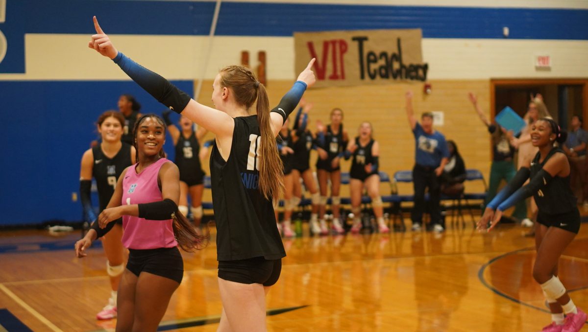 Greta Carlson celebrates her 1000th high school career kill in the Knights game against Crockett on September 20th.
