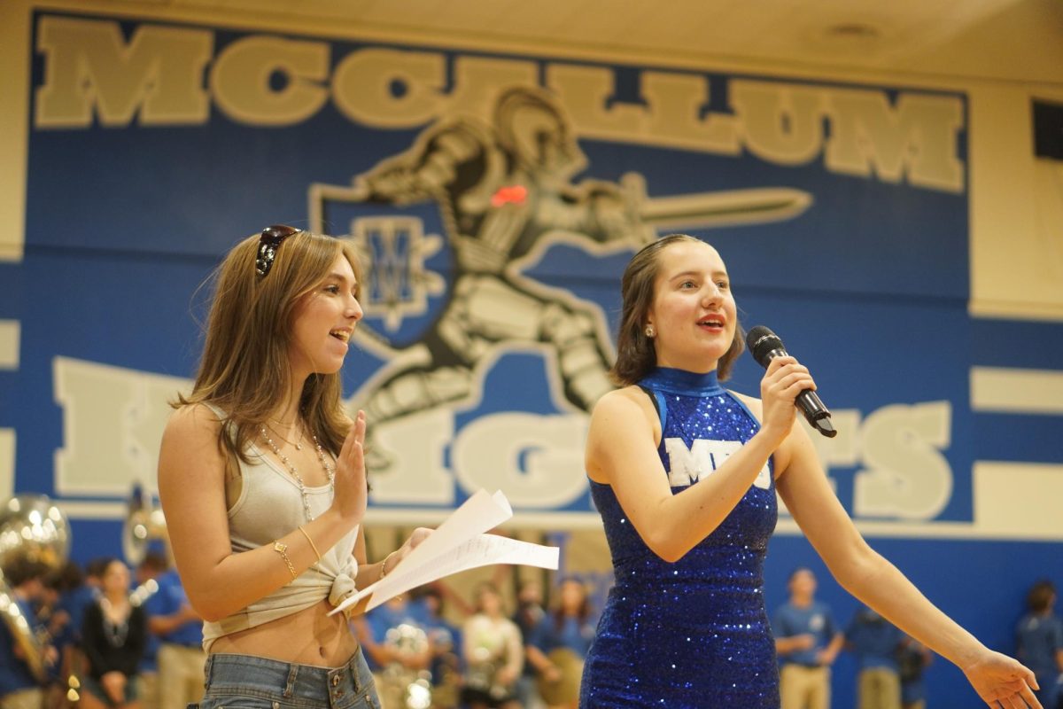 Student body President Kalliope Haltom and Vice President Christina Petropoulos announce the homecoming court at McCallums homecoming pep rally