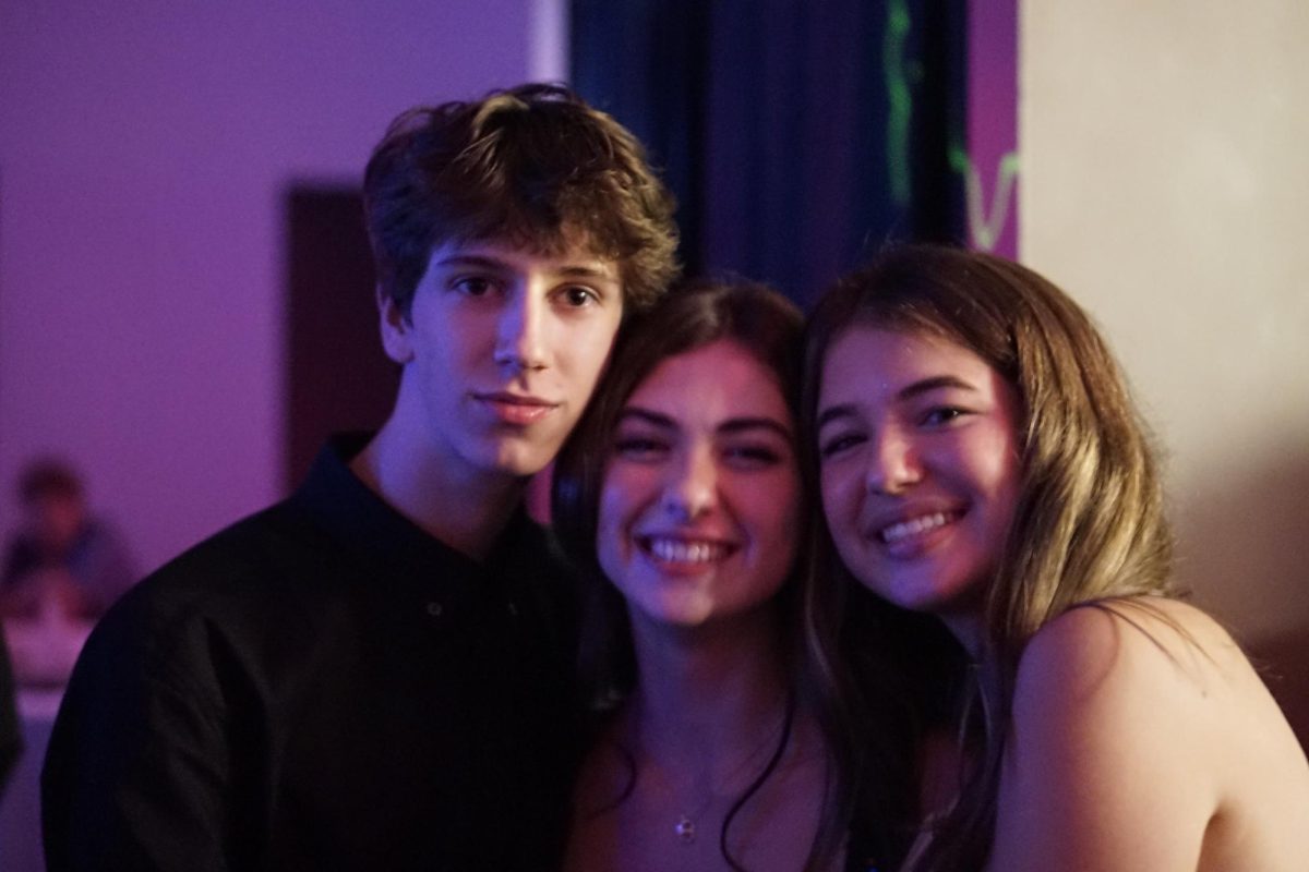 Sophomores Lincoln Faber, Samantha Panzar, and Hallie Cooper at McCallums 2024 Homecoming dance