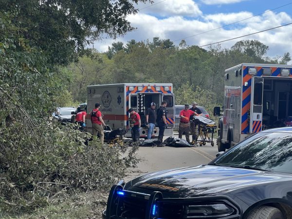 Emergency personnel load body bags into an ambulance in western North Carolina following late September's Hurricane Helene. Photo courtesy of Dave Vandegrift.