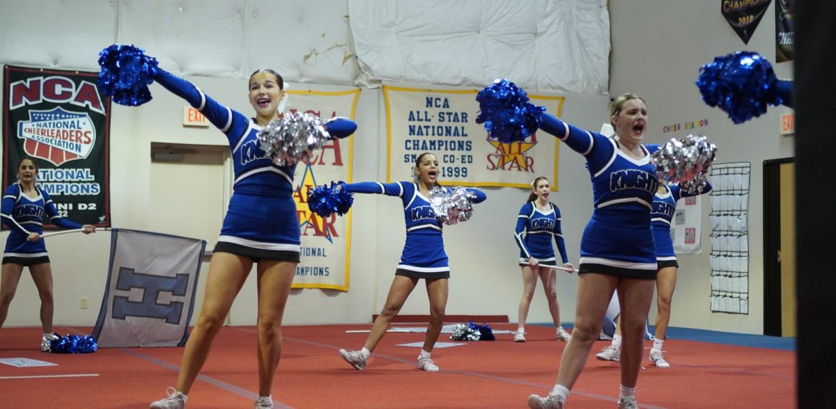 CHEER THE KNIGHT AWAY: Junior Julia Ross, freshman Bell Morton, and sophomore Marlowe Walsh cheer at the McCallum cheer team’s first-ever showoff at Cheer Station last Saturday. 
Caption by Elizabeth Nation. 
