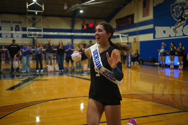 Kai Talebi is introduced the crowd before the varsity volleyball team's senior night game versus Bastrop in the large gym. 