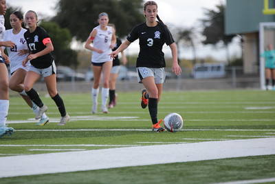 Varsity member, Maya Garwood playing in East View Scrimmage