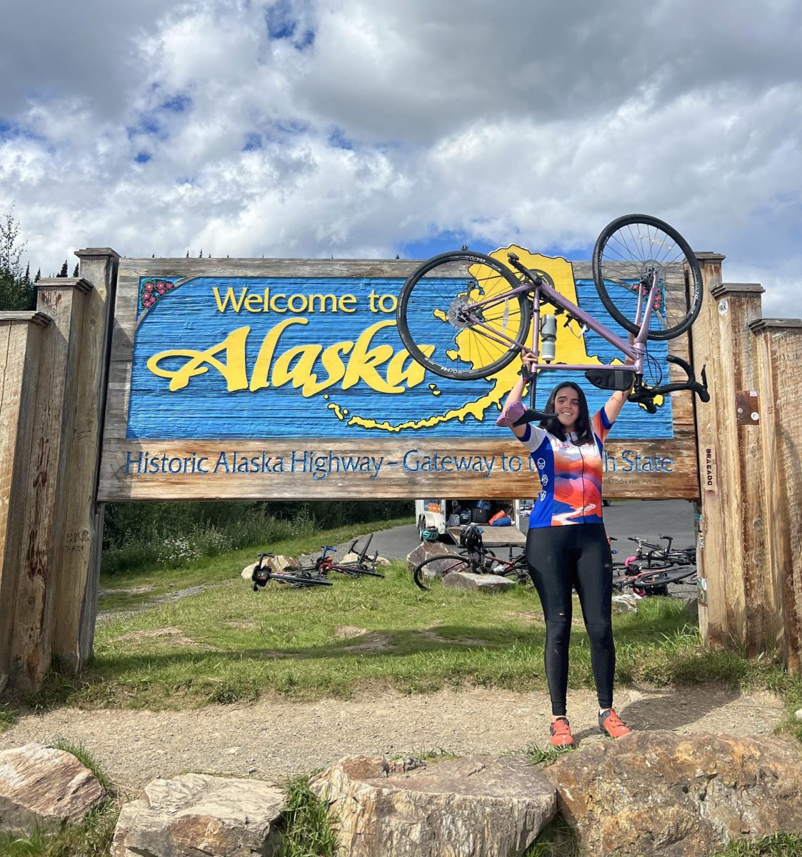 Arellano reaches the official state line of Alaksa marking the final leg to her 4000 mile biking journey. Photo courtesy of Arellano. 