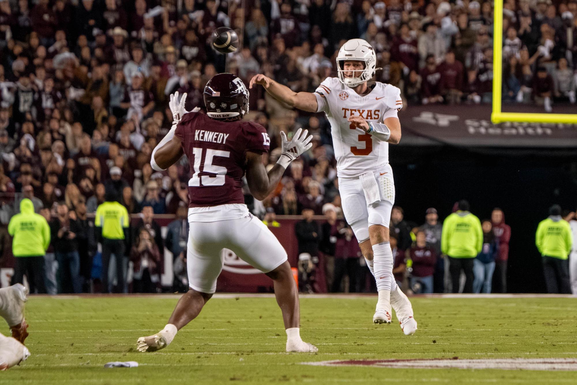 Defensive lineman Rylan Kennedy tries to block a pass from UT quarterback Quinn Ewers  during the Lone Star Showdown game on Nov. 30, 2024. 