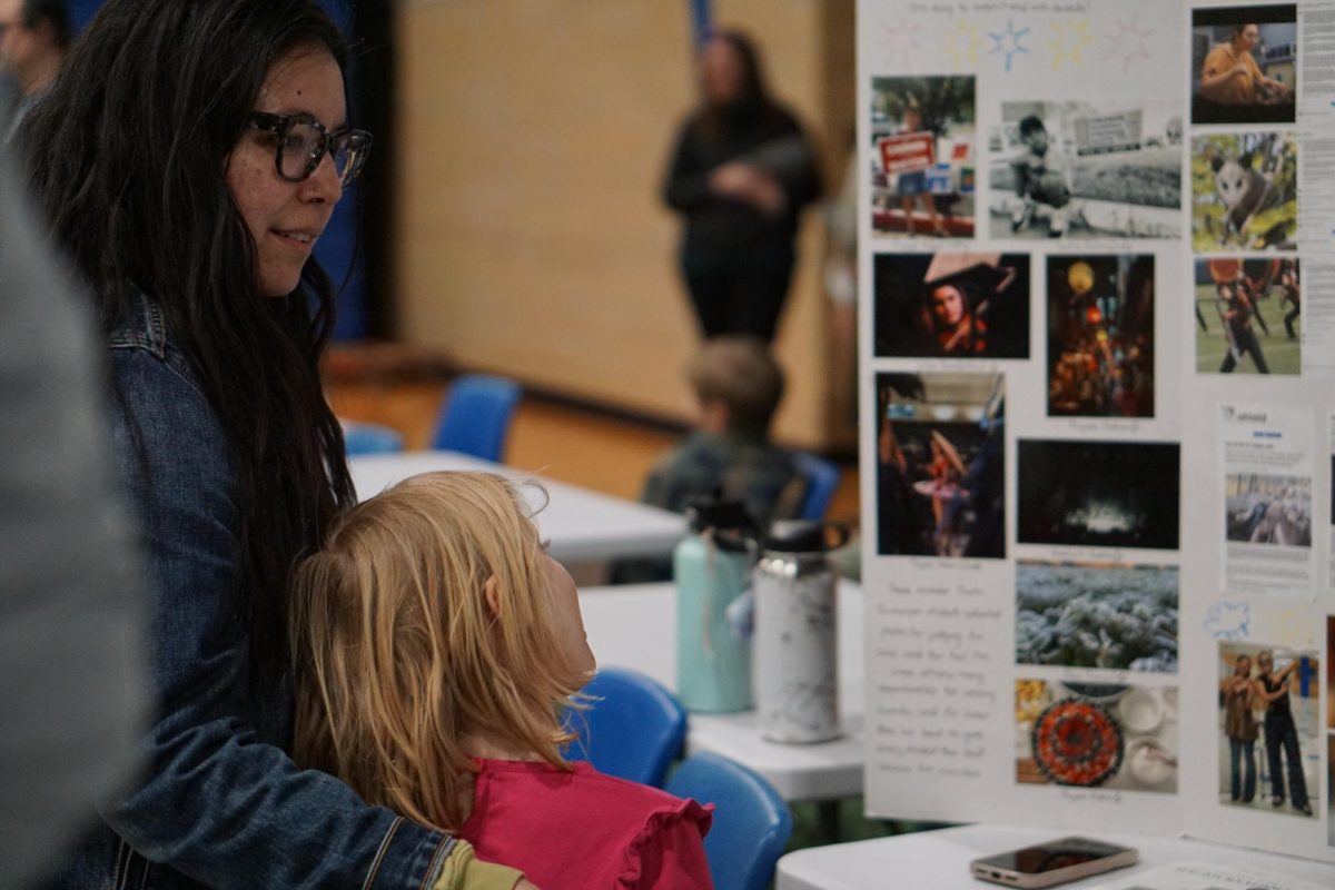 A future Knight and her mom take a look at elective options at the annual Expo Knight on Jan. 15. The Expo Knight for current students took place during fourth period, and took place for future and prospective students and parents after school. Photo by Adele Seeboth. 