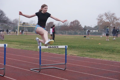 Sophomore Ivy Stone practicing hurdles at practice. Jan 28, 2025
