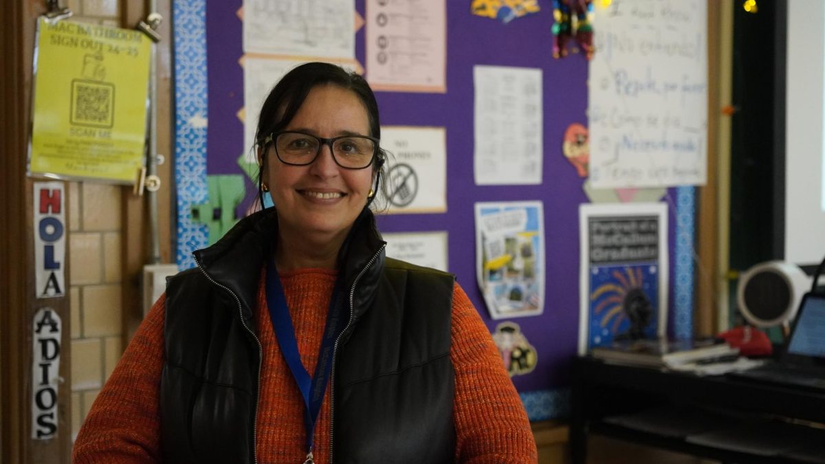 Spanish teacher Janette Miranda-Santiago poses in her Spanish class. “I fell in love with the teaching career,” Miranda-Santiago said. “Why not let me use my talents, let me use my experience? I'm so happy with it.”