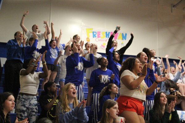 The varsity, the JV-B, the cheerleaders and the students who showed up to support the JV-A Knights on Senior Knight erupt in support the JV-A's effort on the court. The JV-A earned an overtime victory over Bastrop to close its season on a high note.