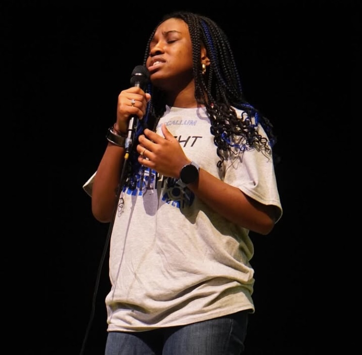 Sophomore Paityn Jones sings "Lift Every Voice and Sing" for the Black History Month assembly on Feb. 10. Written in 1900 by James Weldon Johnson, "Lift Every Voice and Sing" was originally a poem but became the official song of the NAACP in 1919 and became even more prominent during the Civil Rights Movement. In the wake of George Floyd's murder in 2020, the NFL made the song a fixture at its championship game.

Caption by Wren Vanderford. Photo by Jasmine Aung.