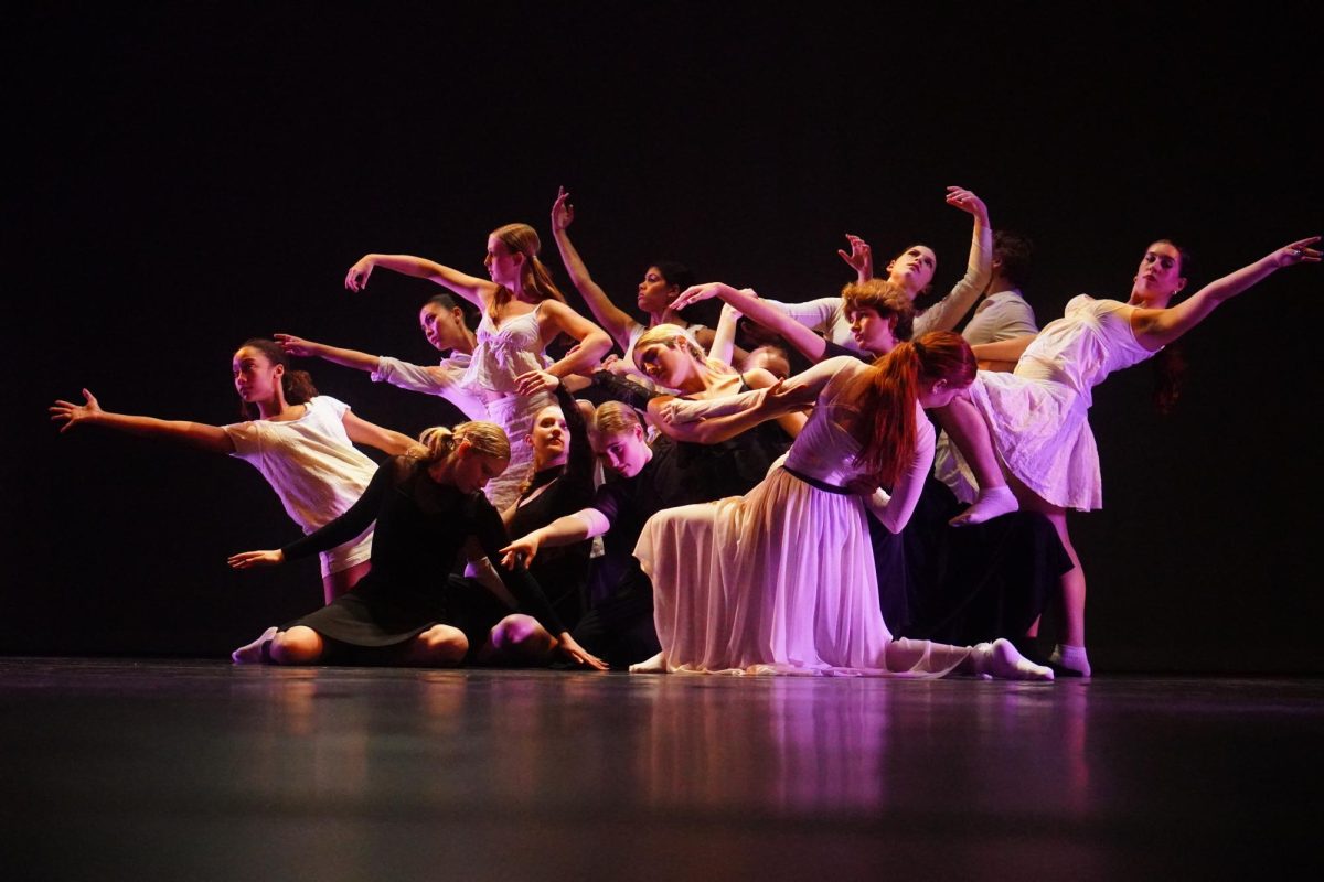 WORKING TOGETHER: McCallum Dance Company performs the student-choreographed “Dancing with Death” during last Tuesday’s dress rehearsal before the spring dance show. Sophomore Pia Sosa performed in five different numbers during the show and thought that everything went well even despite a few challenges. 

“I was getting a little worried closer to the end because there were still a lot of changes happening and people getting shuffled around into places,” Sosa said. “But by the tech week and by the shows, it really felt like we all worked together and came together.” 

Sosa’s favorite part was performing “Come Play,” which was choreographed by junior Maya Tien. Sosa loved being able to work with Tien because of her level of preparation and being able to perform hip hop, since the dance company does not perform that style as much. 

“It’s the first number I do in the show, and I always just felt like it gave me so much energy,” Sosa said. “It felt really good because we rarely do hip hop, so it just felt like such a great opportunity to do something that I don’t get to do all the time.” 

Sosa explained that there were some challenges due to sudden changes in several pieces, however Sosa said she was proud of how the company responded as a whole. 

“Everybody put their best foot forward and pushed through any challenges that they were having,”  Sosa said. “I’m really proud of how the company handled it all.” 

Overall, Sosa said she is grateful for all the work put in by the dance directors and the student choreographers for producing the show. 

“We couldn’t have put the show together without [them],” Sosa said. “Mac dance is amazing and I can’t wait to choreograph next year.” 

Caption by Riley Pita. Photo by Harper Maxwell.
