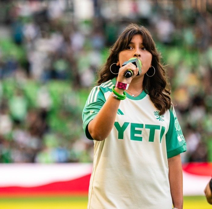 Freshman Sofia Moreno sings the national anthem at the Austin FC game on July 29, 2024 against LA Galaxy. Photo provided by Moreno.