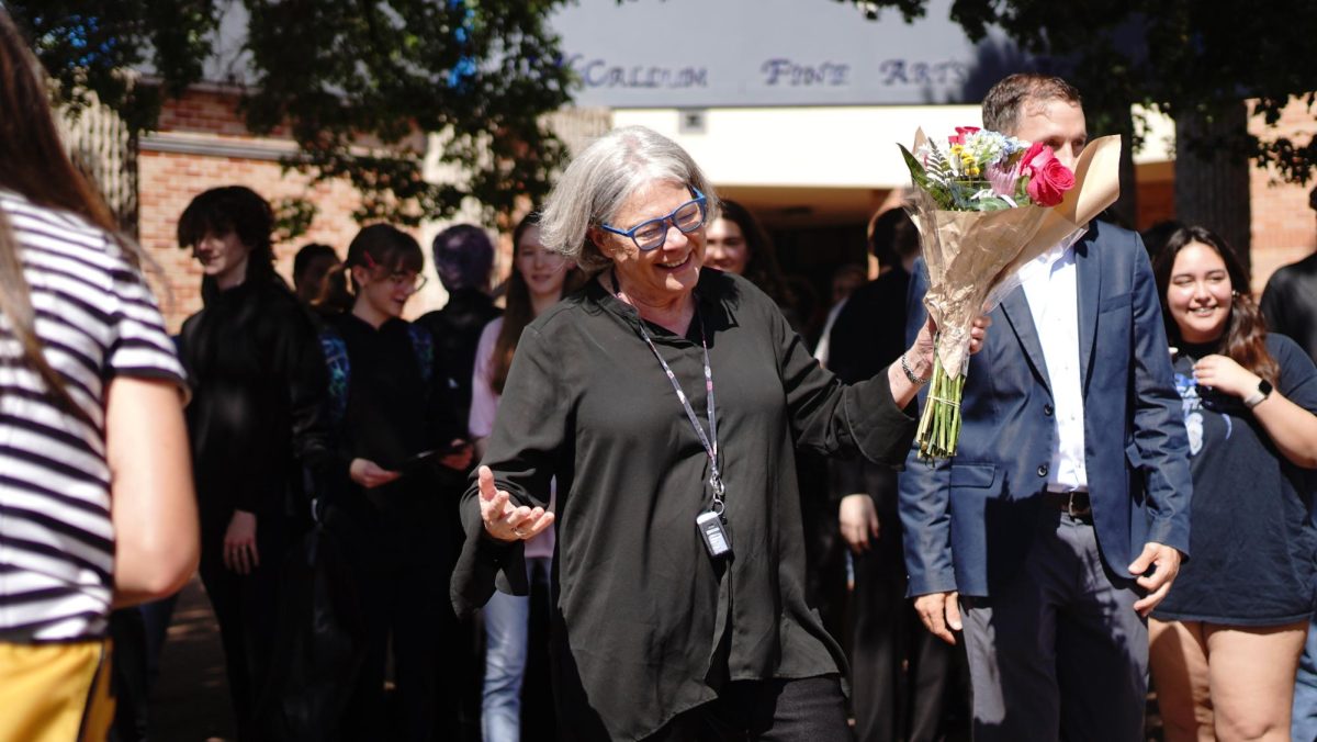 The iconic band director is all smiles after Austin City Councilman Mike Siegel proclaimed it to be Carol Nelson Day in Austin.