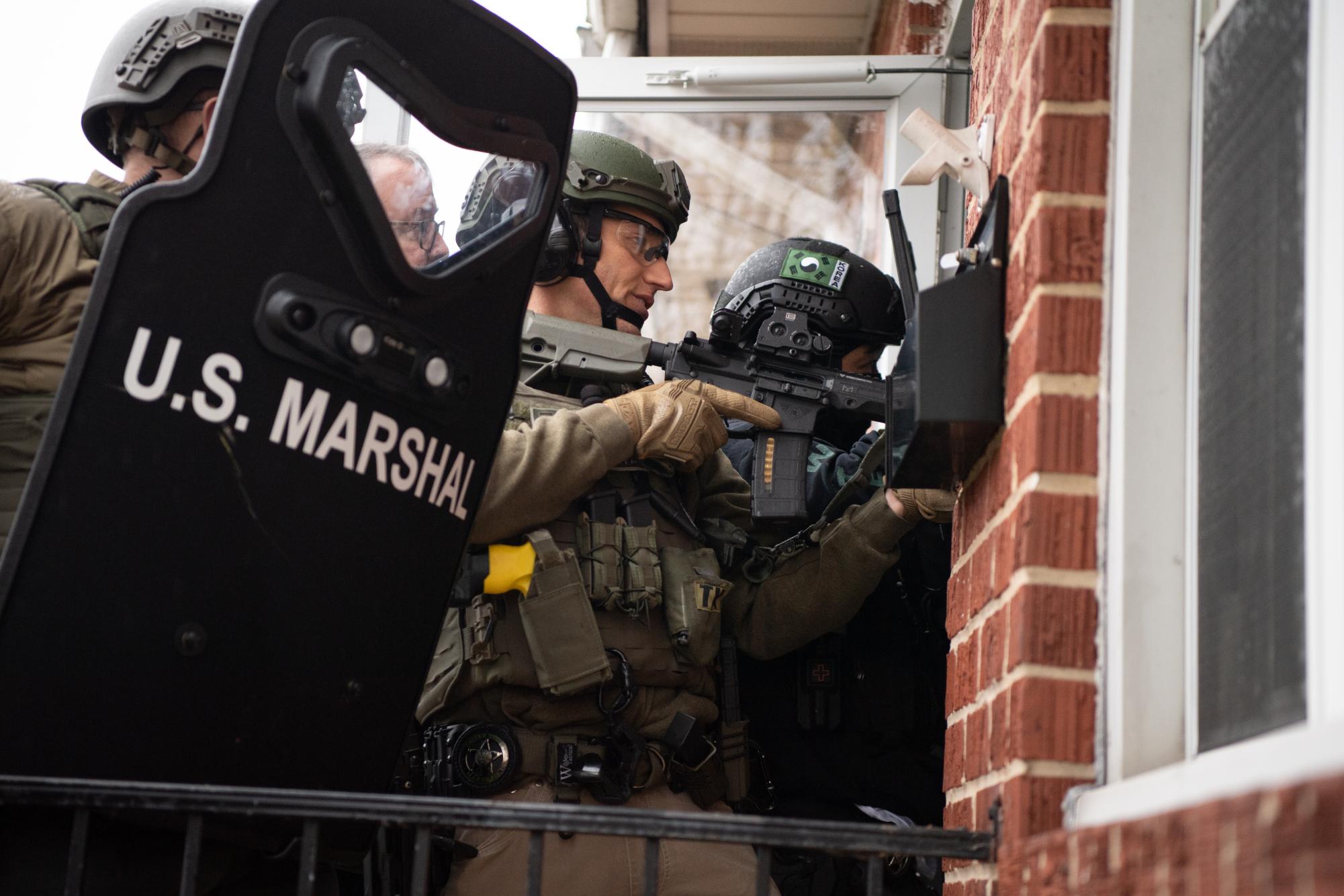U.S. Marshals arrest drug offenders during Operation Ignite the Light in Baltimore, Maryland, in 2022. Photo accessed on the Office of Public Affairs Flicker account. Reposted here under a Creative Commons license.