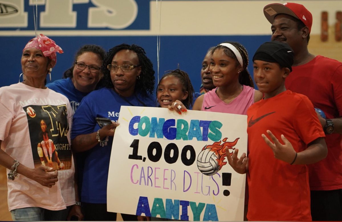 Senior Aaniya Thornton celebrates 1,000 digs with her family after the varsity volleyball game against the LASA Raptors on Friday, Sept. 12.