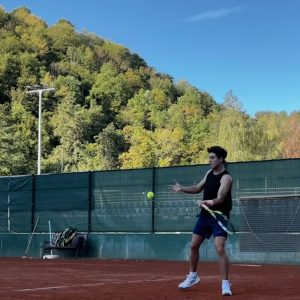 Andrew Lavine plays tennis during tournament in Kuršumlijska Banja, Serbia. Photo courtesy of Lavine.