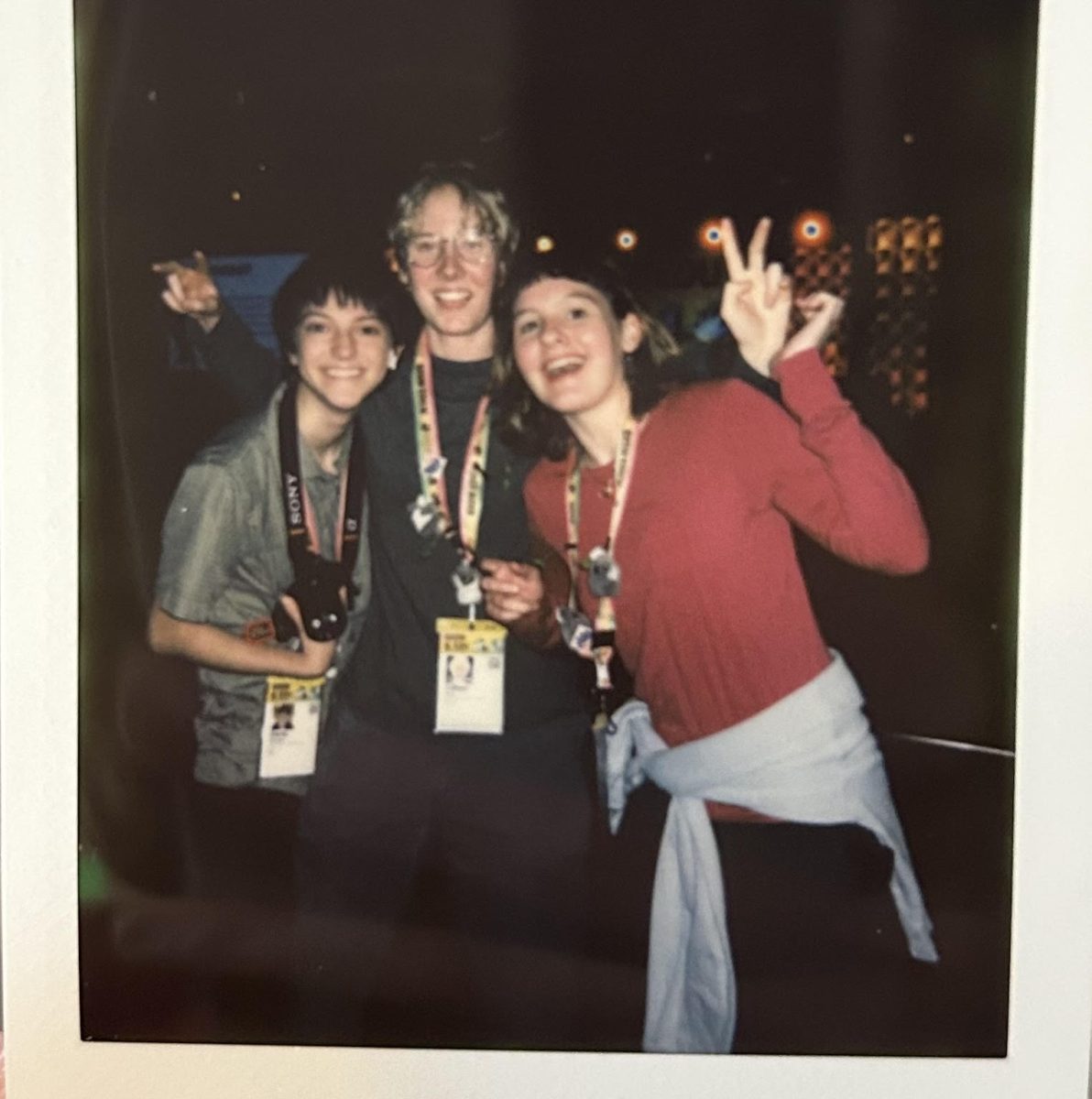 Copy editor junior Carlo Hinsdale, former staffer Lillian Gray and I take a Polaroid at the 2025 SXSW 