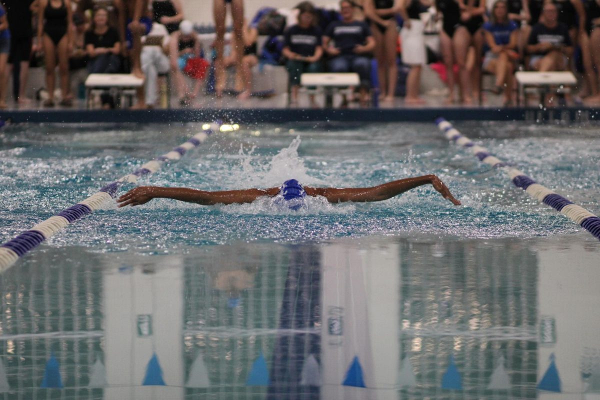 Junior Kiyomi Rathnasingham swims the 50 meter butterfly at Texas School for the Deaf on Oct. 22