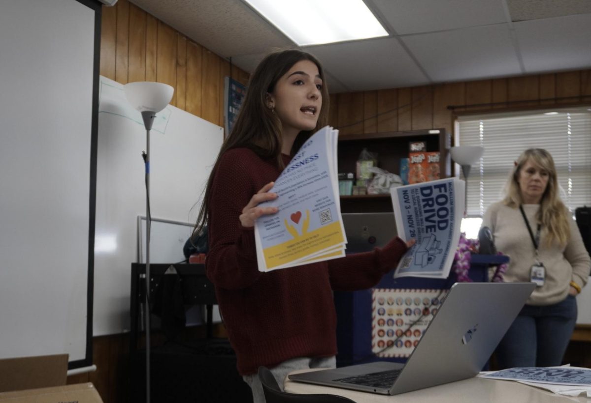Junior Natalia Rivas-Micoud leading a meeting for the United Against Homelessness club on Oct. 30.