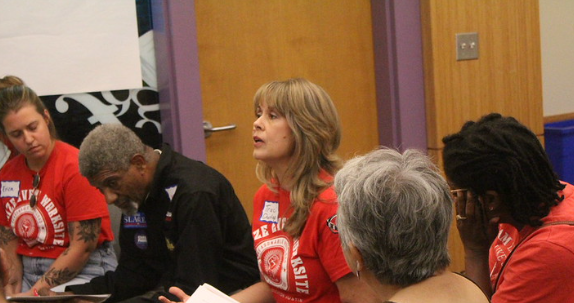 Photos of labor union advocates from Education Austin at the Austin Independent School District's main headquarters on Sep. 17.