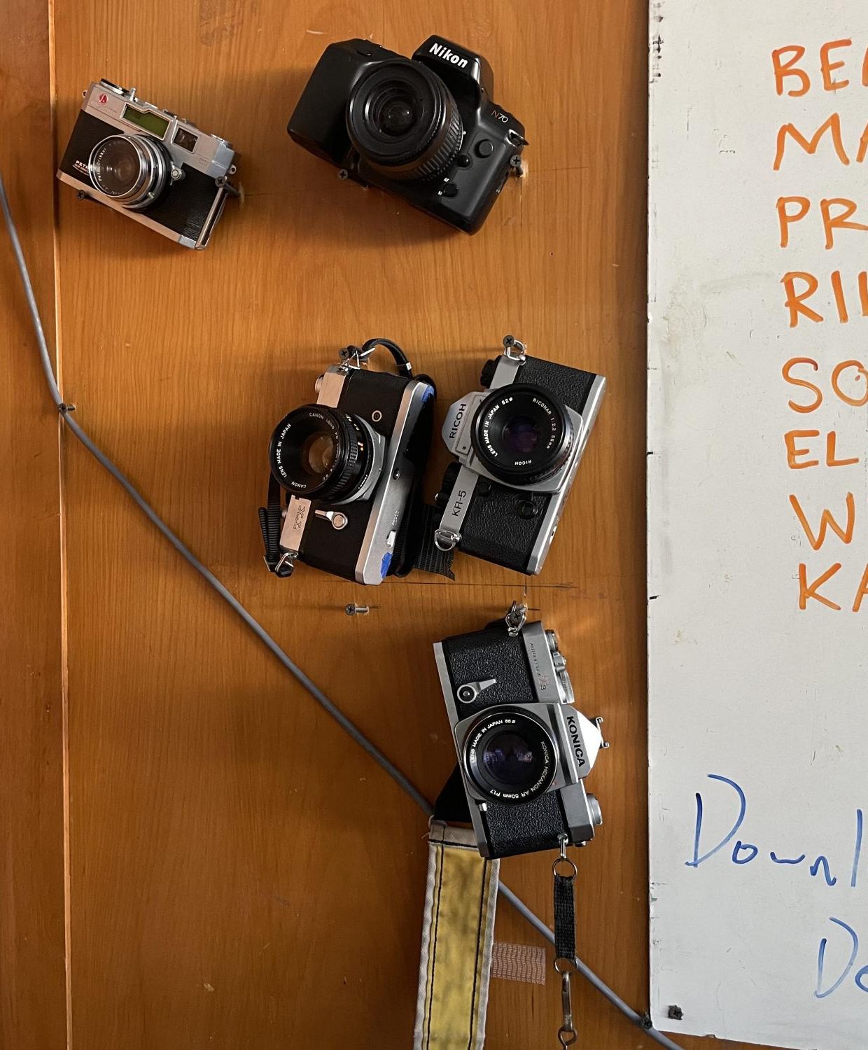 Film cameras hang in room 134.