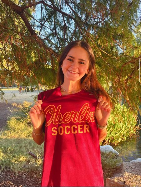 Senior Maya Tackett celebrates her verbal commitment to Oberlin College.