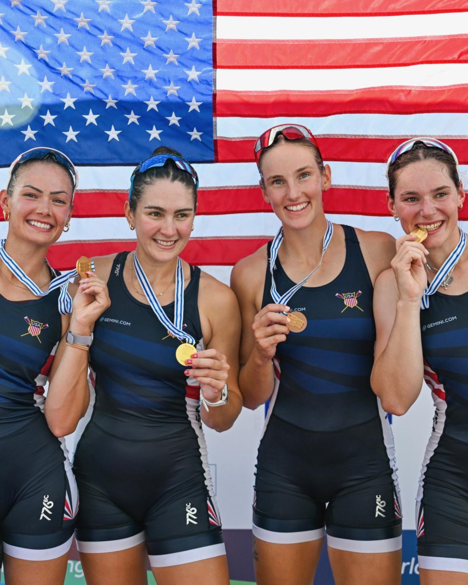 McCallum alum Kate Knifton (left) stands on the podium with her teammates after winning the gold medal at the 2025 World Championships in Shanghai, China. 