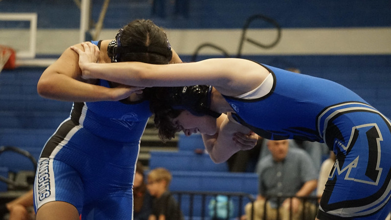 Freshmen Sol Hoyt and Amy Elefanio wrestle at the Gray vs Blue Scrimmage on Nov. 4, 2025. The scrimmage split the team into two sides and allowed new students to experience what participating in a dual would be like. 