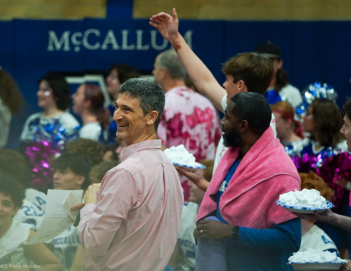 During the Pink Week pep rally on Oct. 17, 2025, PALS adviser Richard Cowles announces the annual pie-a-teacher event where the PALS are able to pie their favorite teachers.
