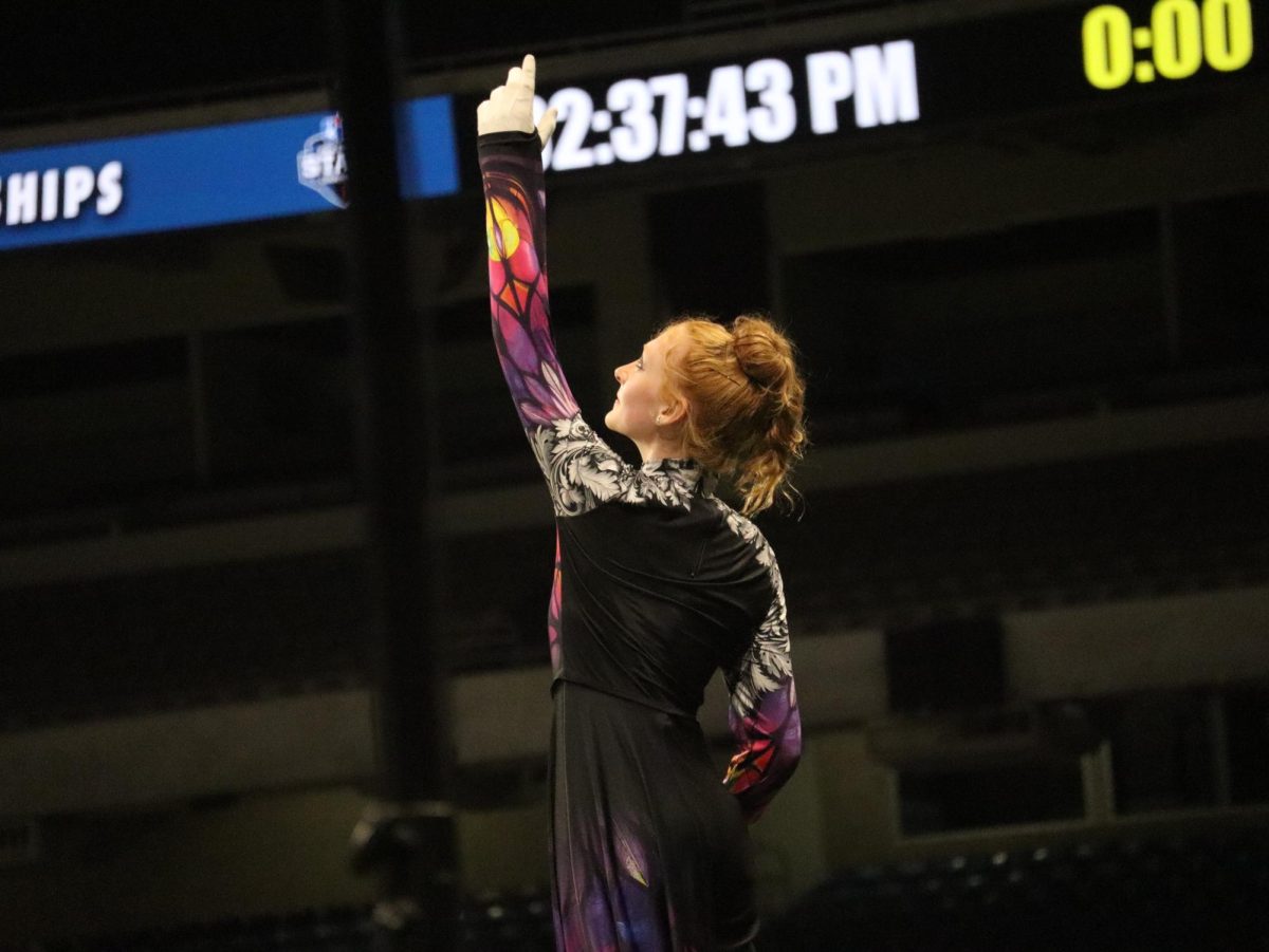 Senior drum major Isadora Lang performs in Band's UIL 5A finals performance, "Gothic Renaissance," on Nov. 11, 2025.