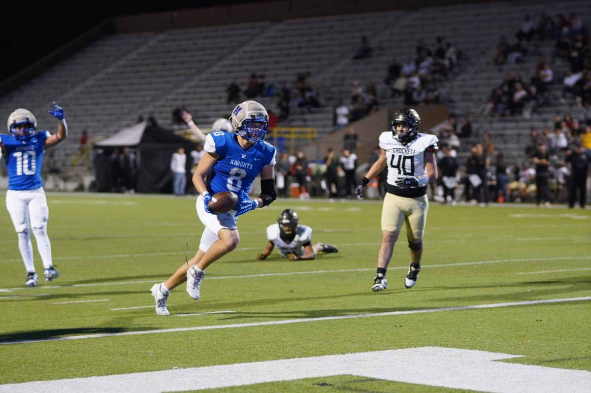 Senior Alex Hopper runs with ball during game against Crockett last season on Nov. 8 at House Park. 