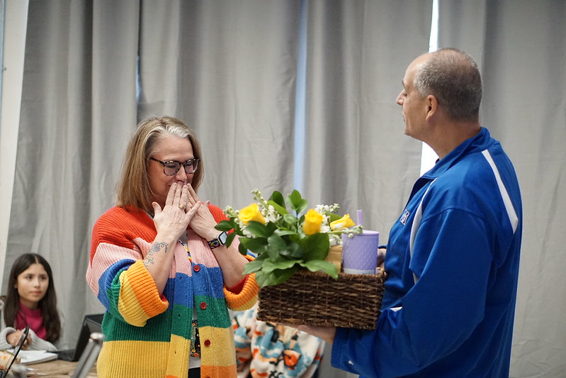 History teacher Jennifer Richter is presented with Teacher of the year by principal Andy Baxa on Jan 16.