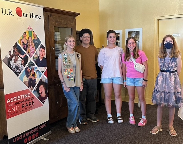 Willa Fischer stands with kids at one of her workshops.