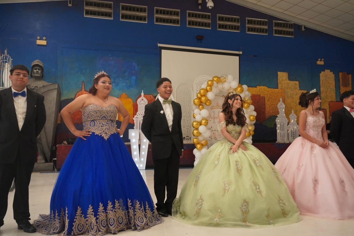 The Quinceañeras and their Chambelanes lined up and laughing after the waltz.