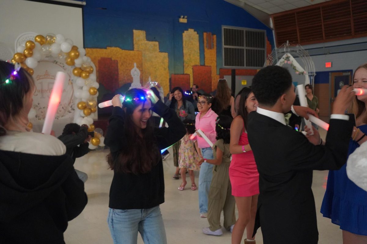 Guests at the Quince enjoy themselves on the dance floor.
