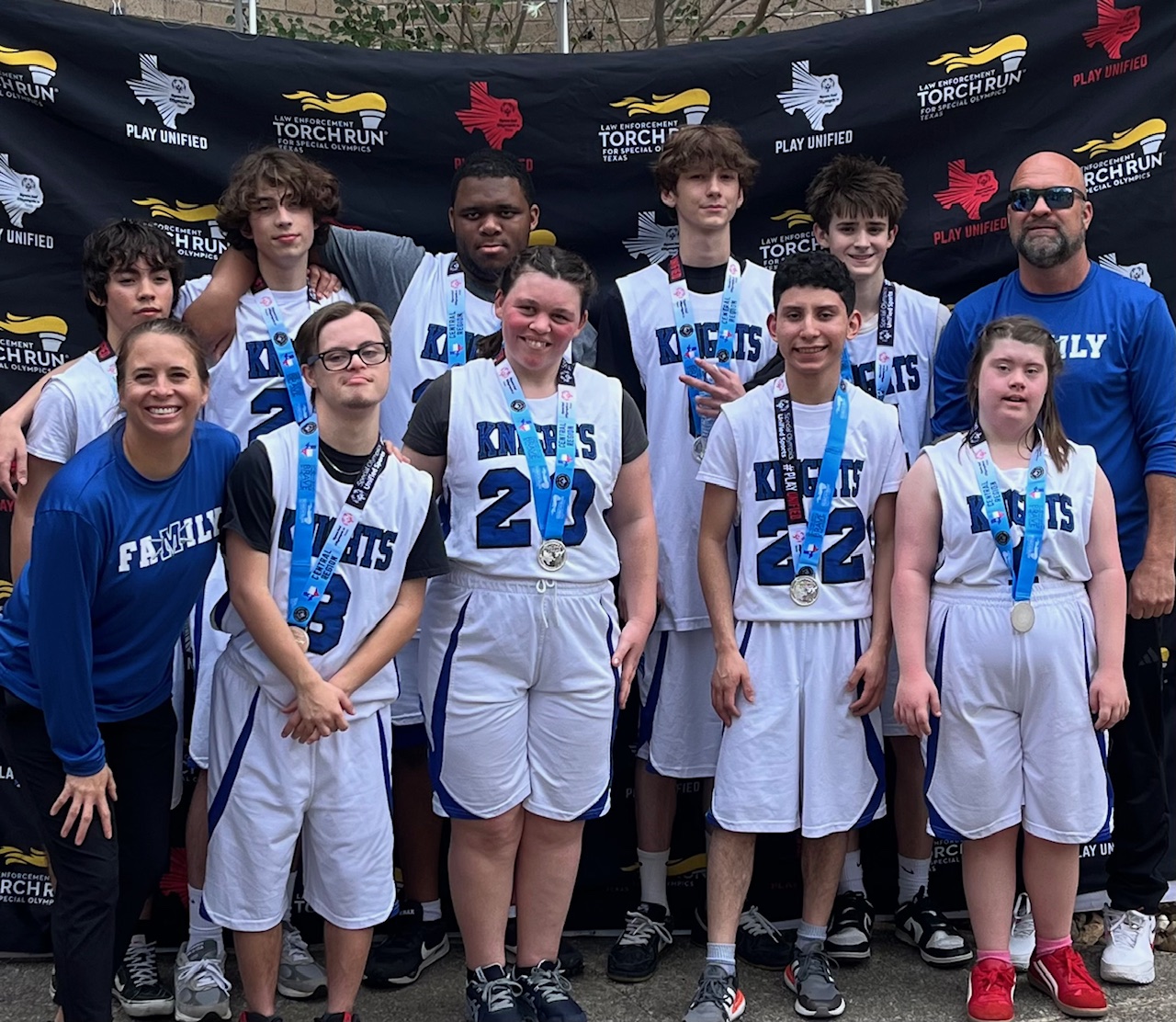 McCallum's unified basketball team is awarded silver medals at the Area 13 Special Olympics Competition. Photo courtesy of coach Eric Sloan. 